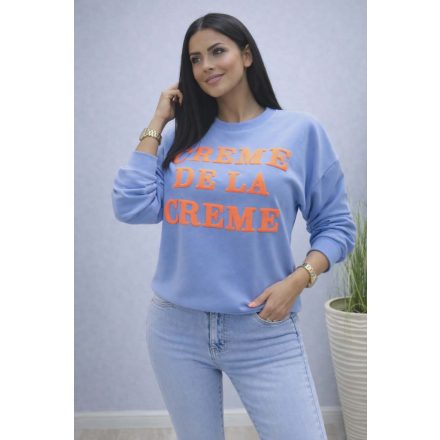 Creme feliratos puha anyagú pulóver (kék-narancs)